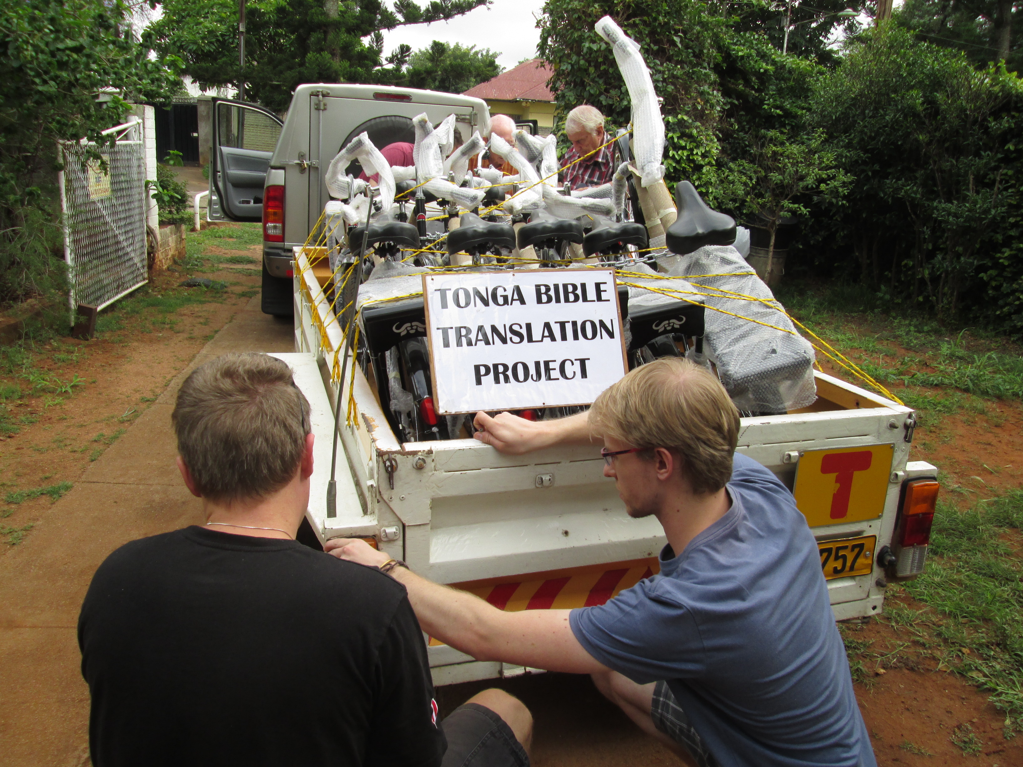 Loading up of bicycles to take to the Tonga Bible Translation team